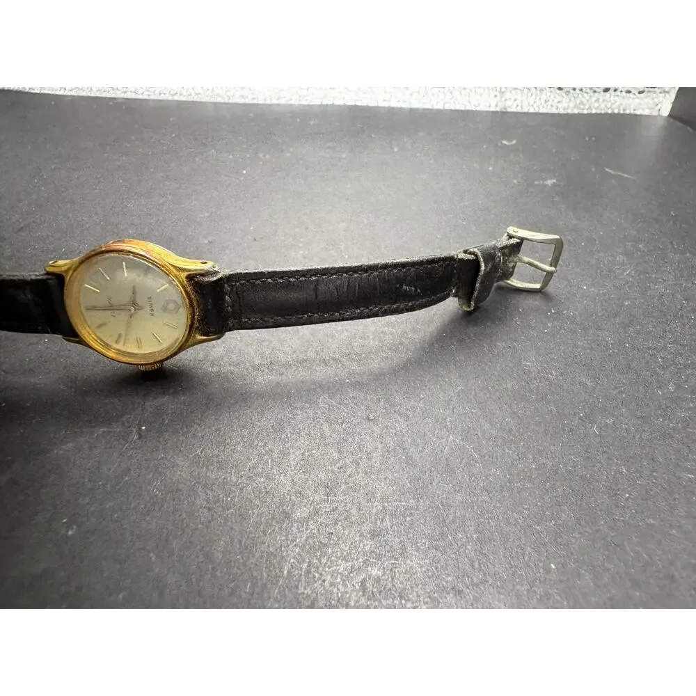 Vintage 1976 Timex Gold Tone Women's Quartz Watch Black Leather Band 18mm